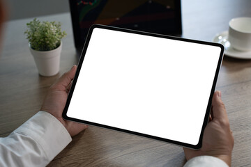 Poster - Digital tablet computer close up man using tablet hands man multitasking with isolated screen