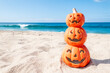 Halloween beach background with three smiling pumpkins