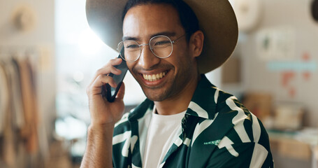 Poster - Smile, talking and man on phone call in retail for networking, orders and planning stock. Happy, thinking and an Asian employee in fashion with conversation about a sale at a boutique or shop online