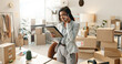 © N Felix/peopleimages.com - Woman, phone call and package with tablet for logistics, startup inventory and small business or courier. Fashion designer or seller talk on mobile, digital technology and e commerce order with boxes