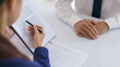 © snowing12 - Lawyer woman explaining business contract and giving consultation legal agreement with businessman