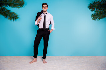 Wall Mural - Full length photo of positive cheerful marketer guy hold jacket tux advertise summer weekends isolated blue shore color background