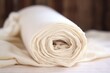close-up of a roll of natural unbleached muslin
