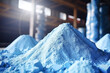 Blue heap or pile of salt granules of phosphorus fertilizers on chemical plant.