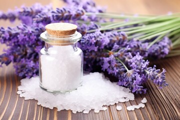 Wall Mural - sea salt in a glass jar next to lavender flowers