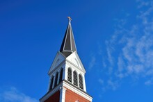 Church Steeple Against A Clear Blue Sky