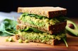 a vegan-friendly chickpea and avocado toast sandwich