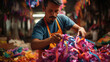 Mexican paper mache artisan creates vibrant piñata workshop vibrant with colors and glue scent.