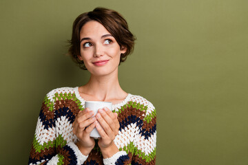 Sticker - Photo of thoughtful pretty lady wear striped outfit drinking cacao looking empty space isolated khaki color background