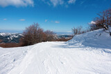 Fototapeta  - Breathtaking scenery on the snowy slopes of Vasilitsa ski center, Grevena, Greece