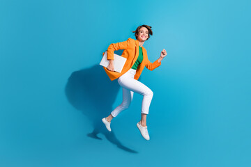 Poster - Photo of cheerful active lady entrepreneur manager wear trendy suit go fast hurry office isolated on blue color background