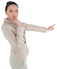 Sticker - Digital png photo of serious asian businesswoman pointing finger on transparent background