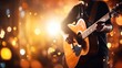 © olegganko - Music bokeh blurred background with guitar with copy space