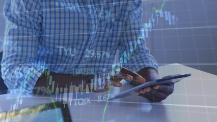 Poster - Animation of stock market data processing against african american man using a tablet at office