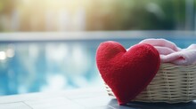 Red Heart And Towel In Basket With Swimming Pool. Health Care, Donate And Family Insurance Concept, World Health Day, Hope, Take Care, Kind, Valentine's Day. Love Concept With Copy Space.
