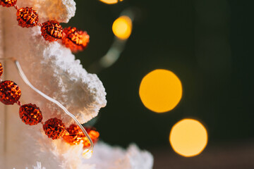 Wall Mural - white crystal grown christmas tree shapes with red beads opposite garlands.