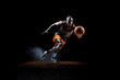 Basketball superstar leaps through the air, isolated against a black studio background, surrounded by dramatic lighting and smoke effects. Generative AI.