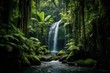 Towering waterfalls in a lush green rainforest, tropical paradise.