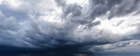 Aufkleber - The dark sky with heavy clouds converging and a violent storm before the rain.Bad or moody weather sky and environment. carbon dioxide emissions, greenhouse effect, global warming, climate change