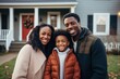 © CojanAI - Portrait of a young family standing in front of a house