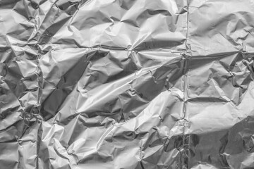 Wall Mural - shiny metal silver gray foil crumpled texture background