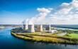 An aerial view of a state-of-the-art nuclear power plant located beside a river