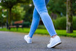 Healthy lifestyle - woman walking in city park
