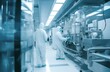 © Andrii Zastrozhnov - In a cutting-edge industrial laboratory, a team of scientists, engineers, and technicians focus on high-tech pharmaceutical production.