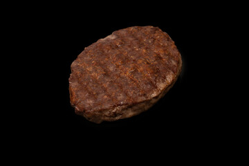 Wall Mural - Cutlet with minced beef isolated on  black background.