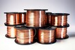 Copper alloy welding wire on spools.