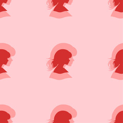 Seamless pattern of large isolated red woman face profile symbols. The elements are evenly spaced. Vector illustration on light red background