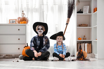 Sticker - Little children celebrating Halloween at home