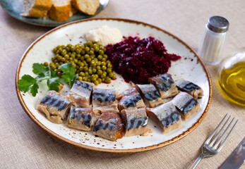 Poster - Cold smoked mackerel with grated beetroot and green peas served in a plate with other table appointments