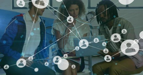 Poster - Animation of padlock and connected icons over diverse coworkers discussing reports on laptop
