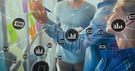 Poster - Animation of connected icons over caucasian man holding coffee cup explaining strategy to coworkers