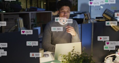 Poster - Animation of multiple notification bars over biracial man analyzing and preparing reports on laptop