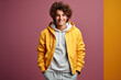 A young man in a yellow hoodie and sweatpants. AI image. Teen in casual wear.