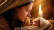 Nahaufnahme - Eine Mutter mit ihrem neugeborenen Baby im Stall, mit einer Kerze im Hintergrund - Maria und Jesus Christus in der Krippe - Weihnachtskonzept