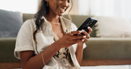 Poster - Woman, phone and typing on floor with communication, streaming or social media scroll in living room of home. Indian, girl and smartphone on ground for chat, texting or tech with internet in lounge