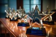 set of various corporate award trophies on a table