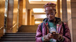 Joyful and carefree African-American man using smartphone isolated on grey, black guy spends leisure in social networks, chatting online, shopping, using new mobile app,Generative AI
