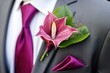 close-up of wedding boutonniere with exotic flowers
