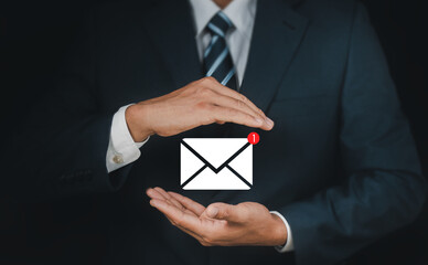 Business people touch on email in virtual screen. New email notification concept for business e-mail communication and digital marketing. Inbox receiving electronic message alert.  internet technology