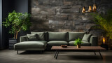 Fototapeta  - Dark green velvet corner sofa near concrete wall with stone wall decor. Loft style home interior design of modern living room