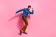 Full length photo of cool stylish gentleman boyfriend dancing at festive vintage party carefree rhythm isolated on pink color background
