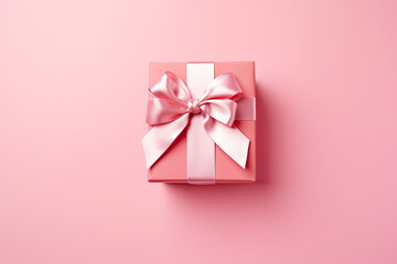 Wall Mural - pink gift box with ribbon top view, Valentine's Day 