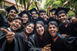 © PRASANNAPIX - Young indian graduates students group celebrating at college campus