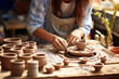 Young woman creating miniature ceramic works as a hobby