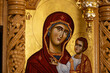 Orthodox icons on a church pulpit. When worshipers enters the church they will kiss this icon and cross themselves.