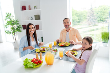 Poster - Portrait of nice friendly family parents daughter spend pastime prepare eat tasty domestic food dining room flat inside